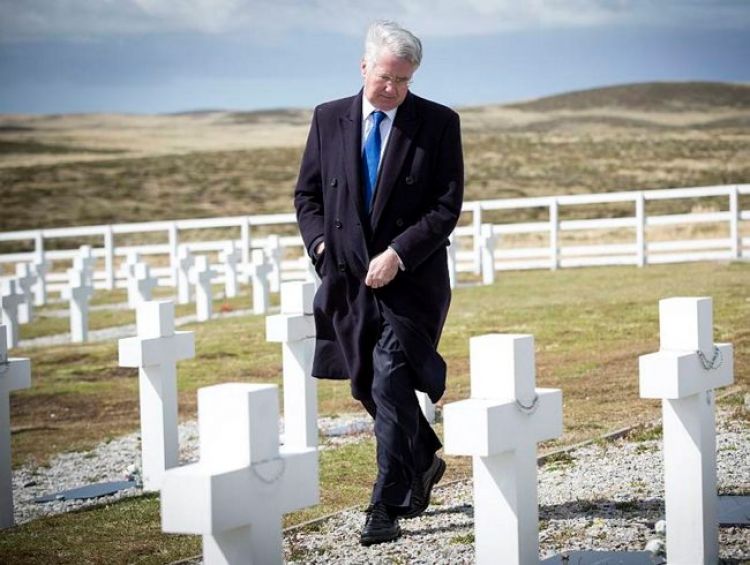 Defence Secretary Michael Fallon MP pays his respects at Darwin Cemetery
