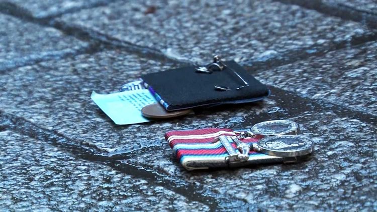 British veterans discard their medals at Downing Street