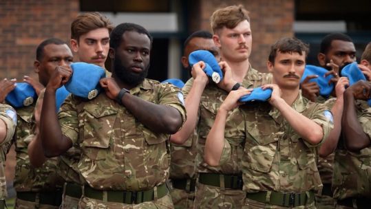 Coldstream Guards swap khaki berets for blue