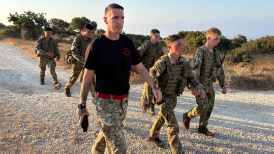 The morning marches, which get progressively more challenging, are designed to build up the guardsmen's resilience to the heat (Picture: BFBS)