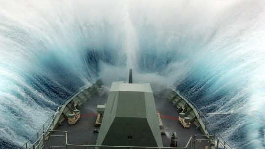 Navy Ship Battles Through Heavy Seas 