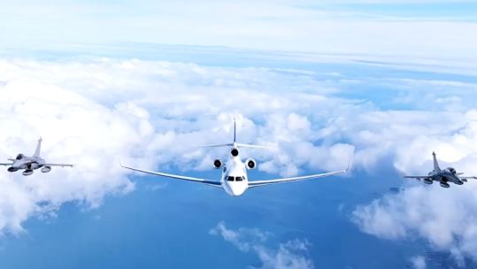 President Macron arrived at the base housing France's nuclear ballistic missile submarines, escorted by two Rafale fighter jets