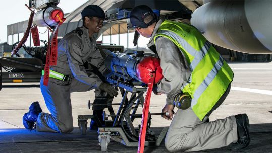 Weapons Technicians work on a Typhoon FGR.Mk 4 at RAF Akrotiri, replacing any munitions to ensure the aircraft can conduct any mission required of it