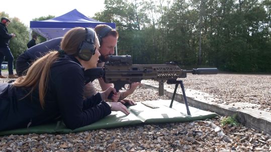Sian Grzeszczyk Melbourne prepares to fire a belt of ammo from the Evolys