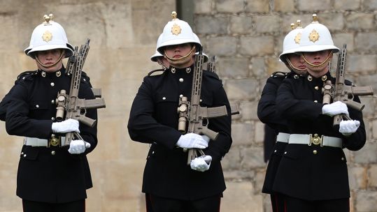 Royal Marines slope arms with their latest assault rifle - the Knight's Armament KS-1 (Picture: MOD)