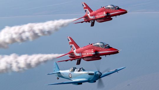The Spitfire flew in formation with two Red Arrows Hawks as it made its way to Leuchars Station