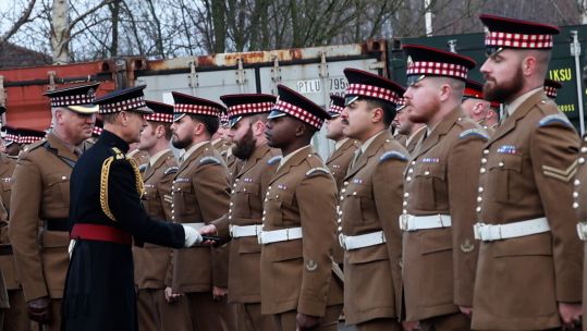 The Duke of Edinburgh presents Nato operational service medals to soldiers from 1st Battalion, The Scots Guards