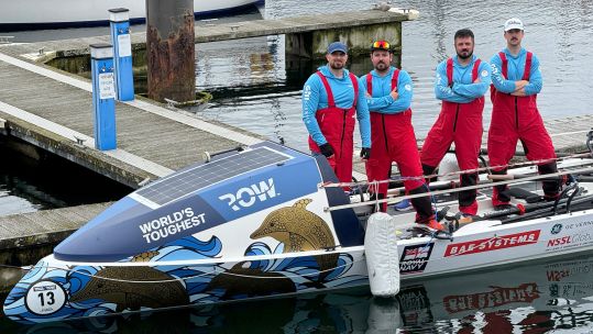 The HMS Oardacious team on board their boat that they will participate on during the World's Toughest Row 