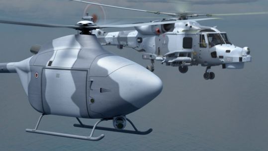This image from Leonardo shows a Proteus uncrewed helicopter operating alongside a Royal Navy Wildcat