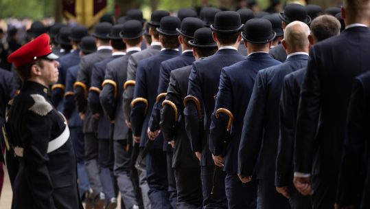 Bowler hats, dark suits and furled umbrellas were the order of the day for some serving and retired personnel attending the service - the traditional attire being a semi-official uniform for events such as Cavalry Sunday
