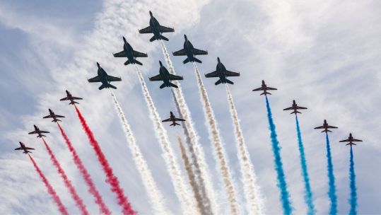 The Red Arrows perform a mixed formation flypast with their US Navy counterparts the Blue Angels in Maine as they continue their US tour marking 250 years since the declaration of independence