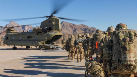 Cover image: Library photo of US troops in Afghanistan (Picture: US Department of Defense).