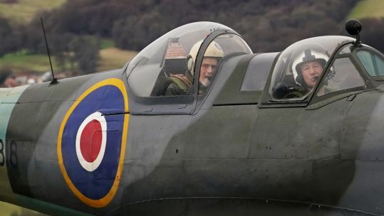 102-year-old Jack Hemmings AFC flew a Spitfire plane to mark 80th anniversary of the military charity Mission Aviation Fellowship (Picture: PA). 
