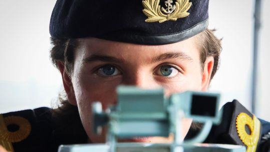 Sub-Lieutenant King takes a reading on board HMS Prince of Wales as she sails from Goa in India on Operation Highmast with Carrier Strike Group 25