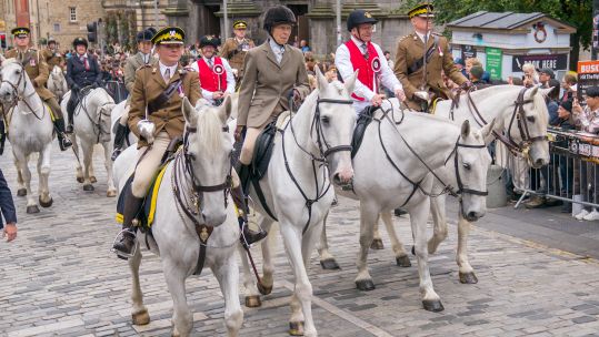 Princess Anne rides alongside Scots DG soldiers and the Lord Provost at Edinburgh Riding of the Marches