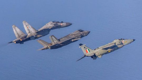 At the end of mock hostilities, a British F-35B is flanked by an Su-30MKI and a Jaguar