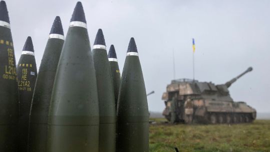 155mm artillery rounds stacked up behind the line of AS90s and their Ukrainian operators DATE 24032023 credit MOD_0