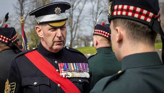 Garrison Sergeant Major Vern Stokes casts his eye over the soldiers -  he's responsible for ensuring ceremonial proceedings go off without a hitch and ensuring professional standards are maintained
