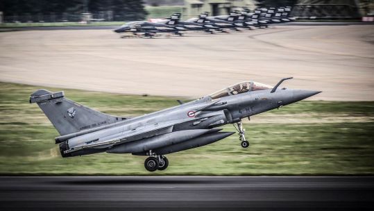 171125 Armée de l'Air Rafale taking off at RAF Leeming with the 100 Sqn Hawks in the background 15 April 2016 CREDIT MOD