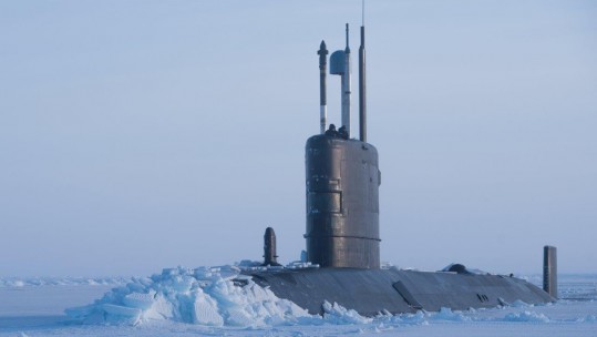 HMS Trenchant breaking through ice (Picture: Crown Copyright).