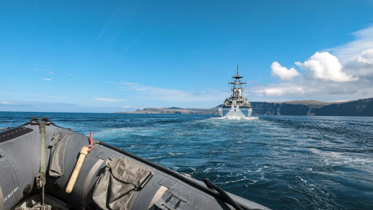 A view of the ships stern from one of HMS Tynes boats 