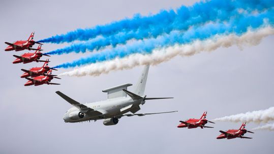 The iconic Red Arrows display team performing with the Wedgetail AEW Mk1 at the Royal International Air Tattoo in Fairford