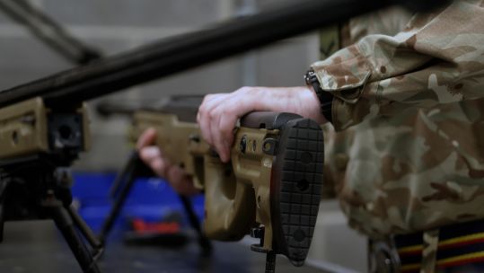 An L115 A3 Long Range Sniper Rifle is prepped for a barrel change