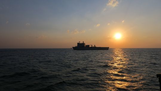2021 Mother Ship RFA Lyme Bay at sunset during an exercise CREDIT RN 13062022
