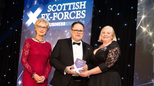 2024 Business Leader of the Year winner David Wood of Drumfork Nursery & Forest School is pictured with broadcaster Sally Magnusson, left, and Susie Hamilton, Scottish Veterans Commissioner CREDIT Forces in Business Awards