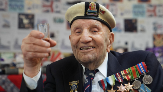 D-Day veteran Dougie Shelley seen celebrating his 100th birthday in 2025