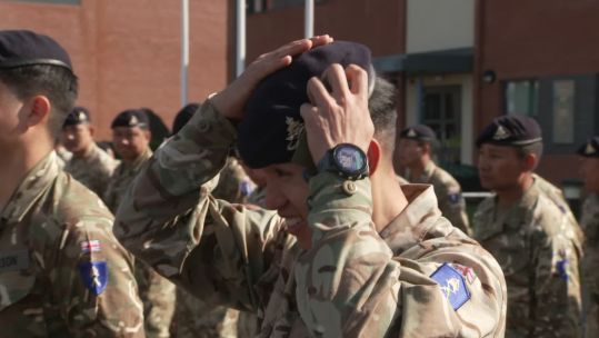 The King’s Gurkha Artillery soldiers receive their berets