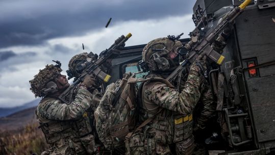 A candid shot of Royal Marines engaging the enemy on Exercise Tarassis was one of the images that earned Petty Officer Alex Ceolin photographer of the year