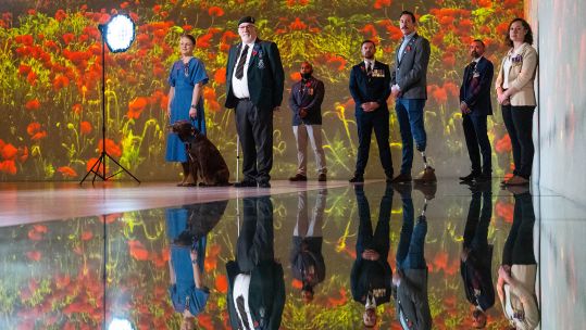 Veterans and their families whose lives have been reconstructed with the aid of the RBL gathered at Frameless (Picture: PA)