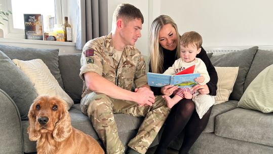 Corporal Crean, Nina and Charlie in their renovated home