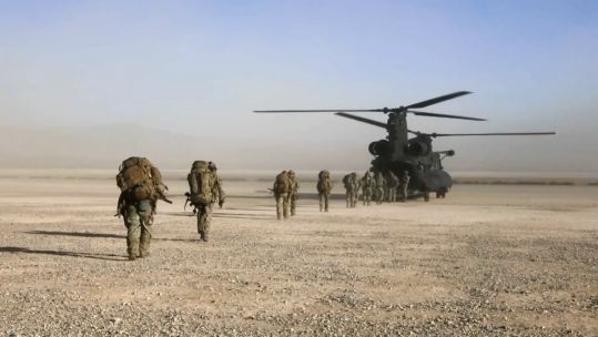 Troops board a Chinook
