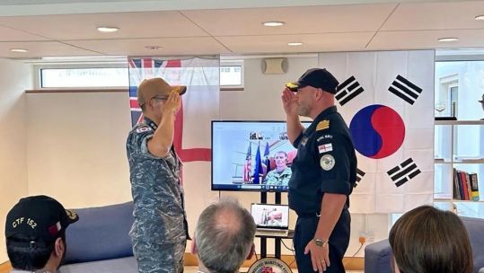 Captain Jase Eacock formally hands over command to the Republic of South Korea's Captain Yoon Hyun-woo RO (Picture: Royal Navy)