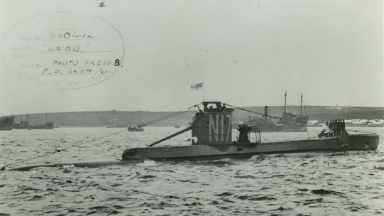 HMS Urge Admiralty old black and white post card with a bird flying 