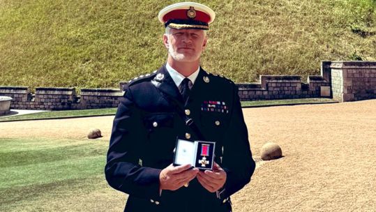 The Veterans Minister and Royal Marines colonel shows off his decoration