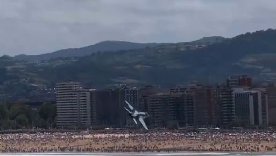 The Spanish air force EF-18A gets close to tourists and spectators
