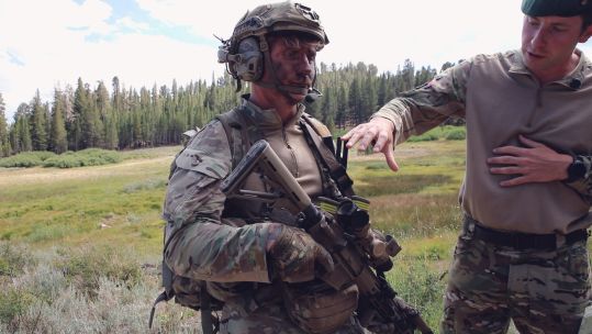 This Royal Marine is kitted out to spend up to 24 hours in mountainous terrain