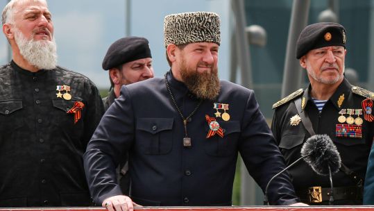 Head of the Chechen Republic Ramzan Kadyrov (centre), attending a military parade on Russia's Victory Day
