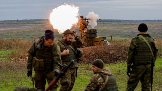 A newly-mobilised Russian reservist fires a rocket-propelled grenade (RPG) launcher during a training on a range in Donetsk region, Russian-controlled Ukraine 