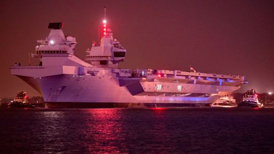 2K5EA6R HMS Prince of Wales leaving Portsmouth, UK for repairs
