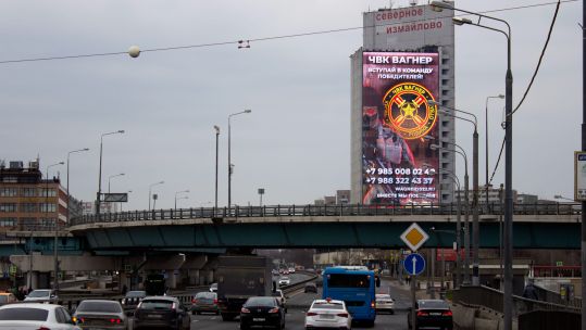  A recruiting on-screen advert of the Wagner Group in Moscow