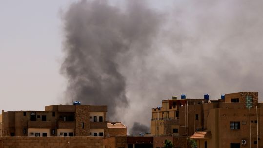 Smoke is seen rise from buildings during clashes between the paramilitary Rapid Support Forces and the army in Khartoum North, Sudan