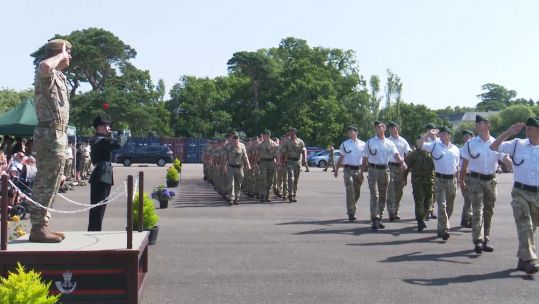 The sun shone for the Riflemen for the homecoming parade.