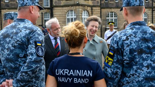 Princess Anne smiles as she meets Ukrainian Navy band members during Edinburgh Tattoo rehearsal (Picture: REMT - Royal Edinburgh Military Tattoo)