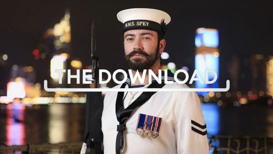 One of HMS Spey's guard stands smartly to attention on the patrol ships flight deck during a reception Download TN CRED MOD