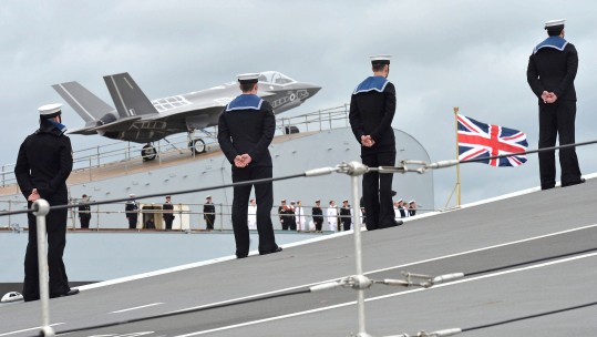 Anonymous Sailors Onboard HMS Queen Elizabeth with F35 In Background
