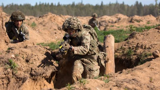 British troops on Exercise Spring Storm with NATO allies next to teh Russian border.